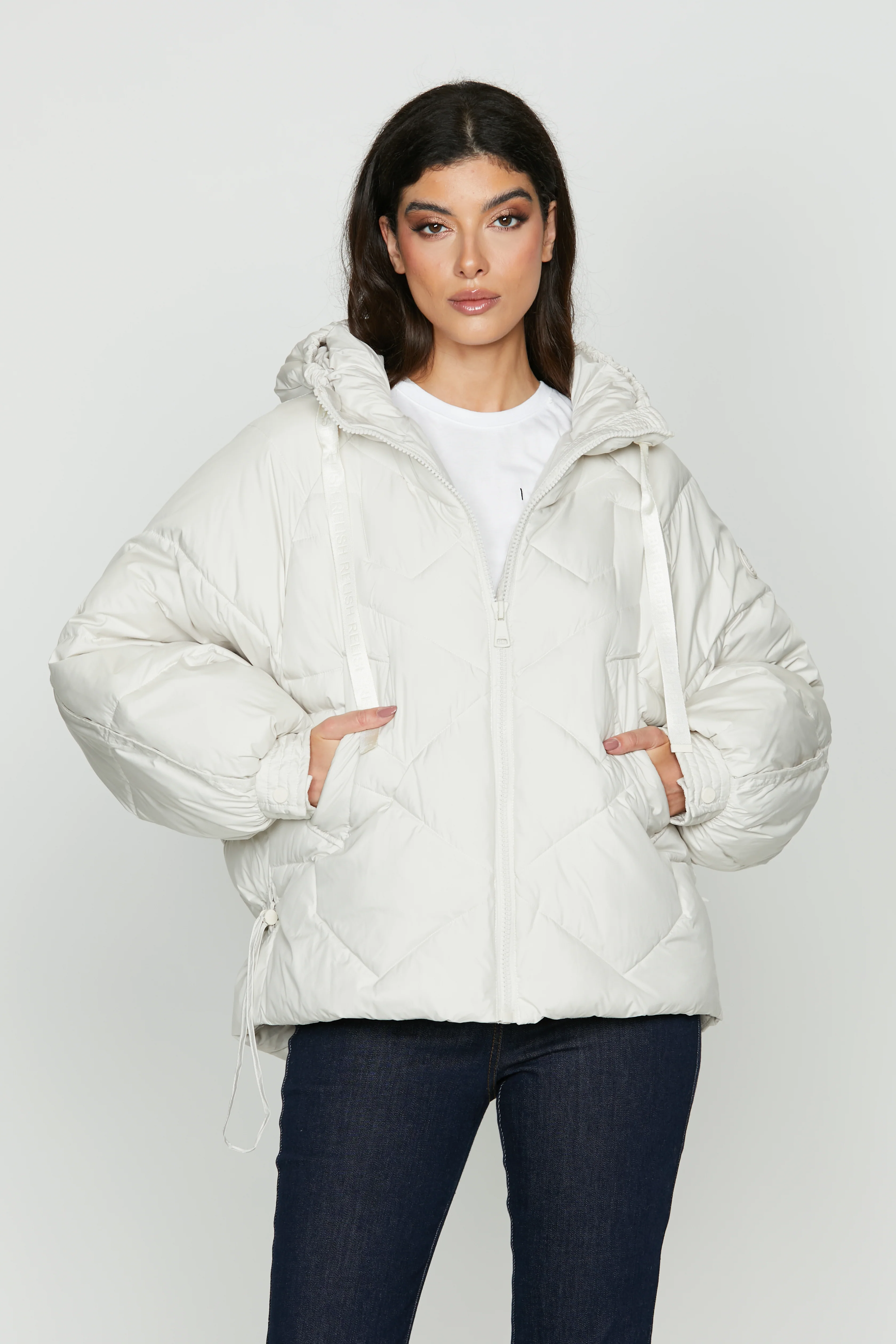 Piumino TEVARI manica lunga raglan con cappuccio più tasche più zip più coulisse