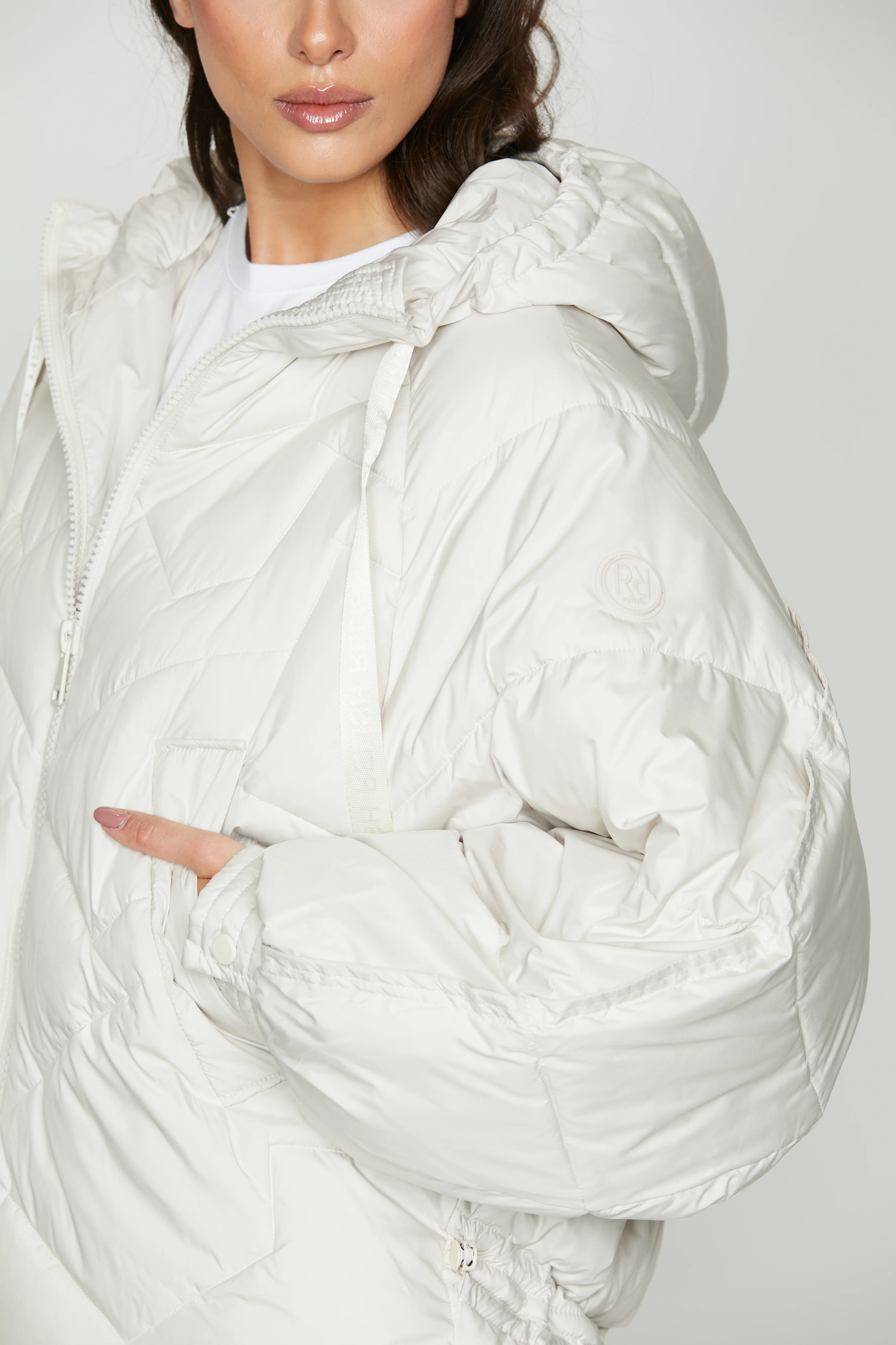 Piumino TEVARI manica lunga raglan con cappuccio più tasche più zip più coulisse - Image 4