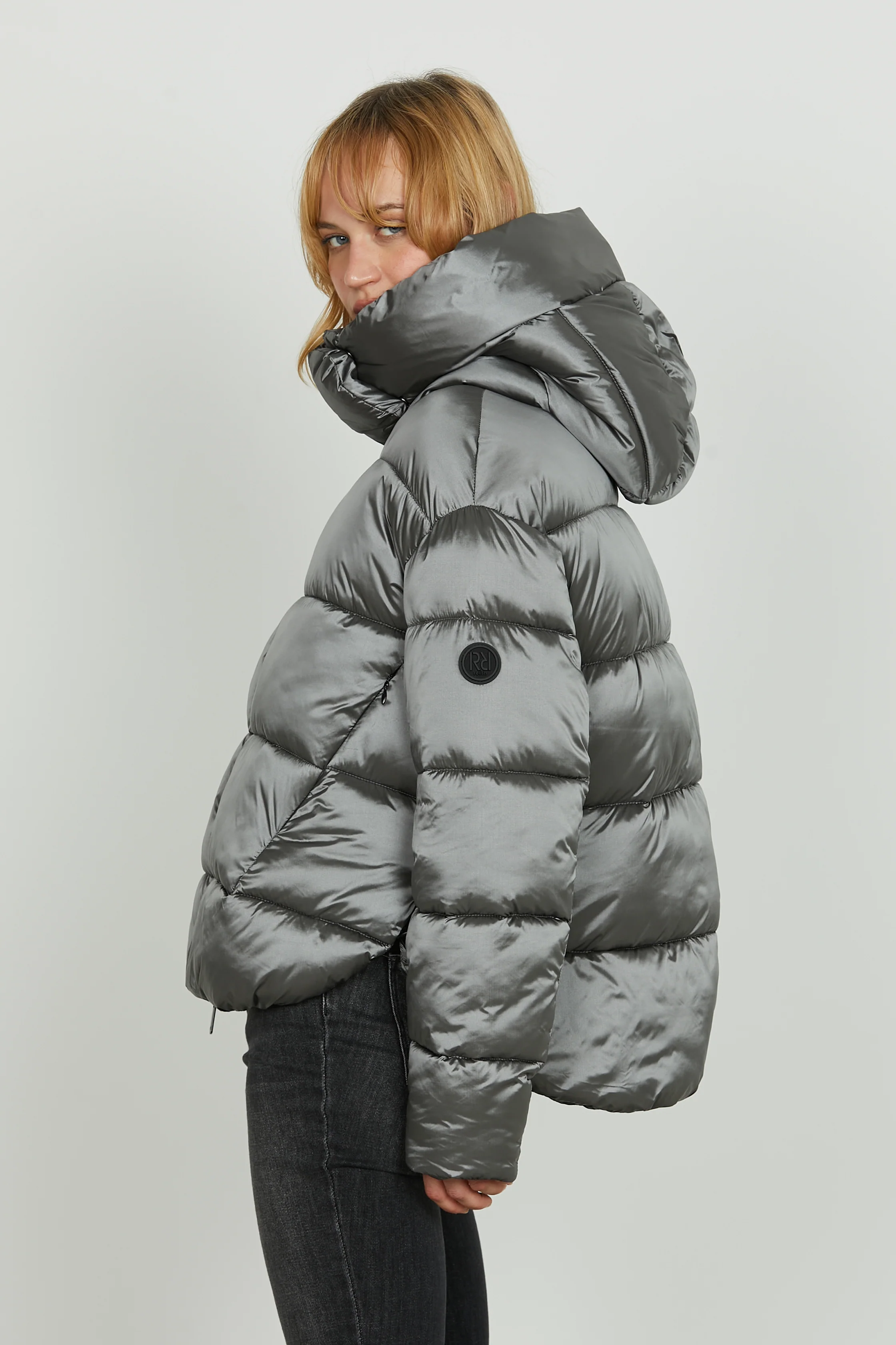 Piumino TONATIUH_A manica lunga asimmetrico con coulisse più cappuccio più zip - Image 3
